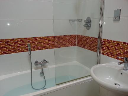 Freshly tiled Bathroom